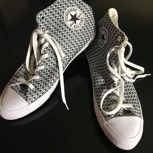 Women’s high top Chuck Taylors